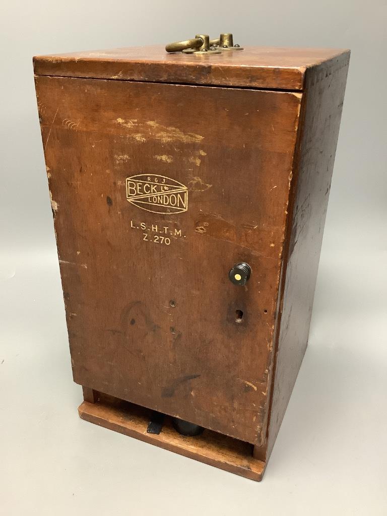 A Beck, London cased microscope